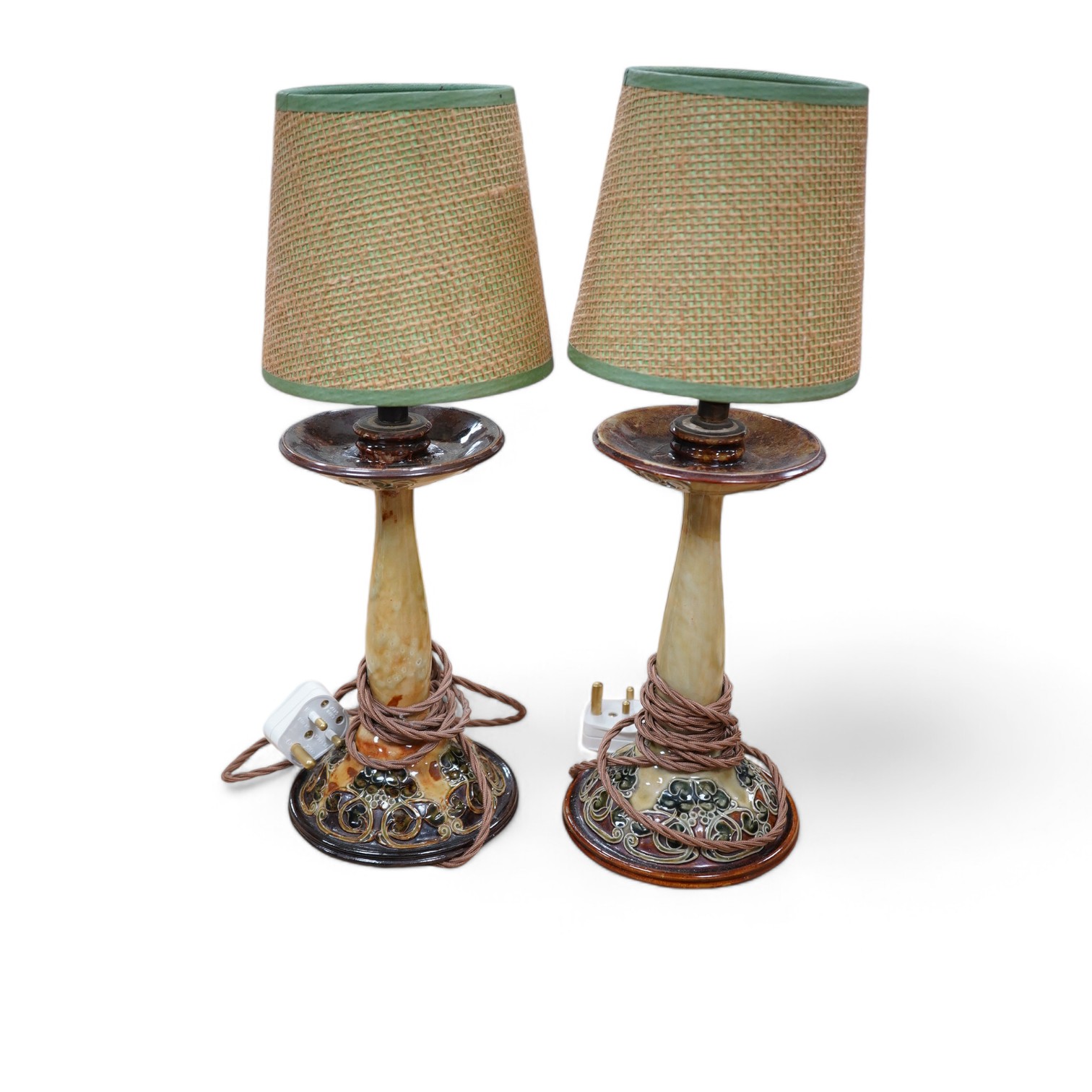 A pair of Royal Doulton stoneware 'candlestick' bedside lamps and shades, 41cm total. Condition - good, not tested